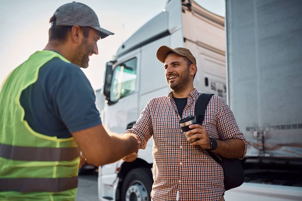 happy-truck-driver-and-freight-transportation-manager-single-point-capital