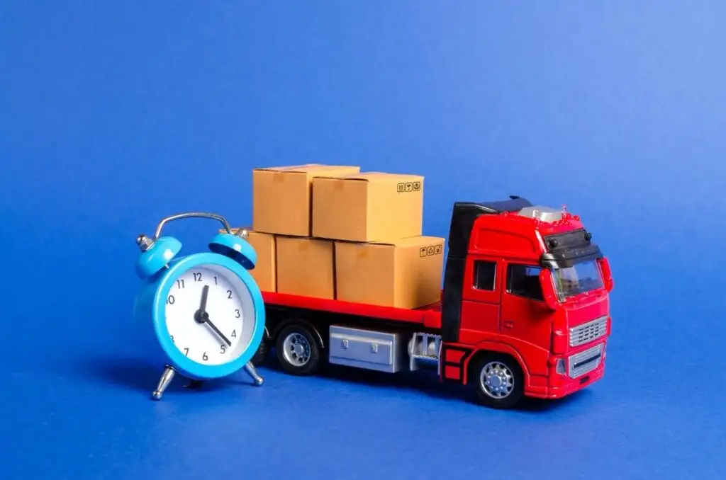 a-red-truck-with-cardboard-boxes-and-a-blue-alarm-single-point-capital-1024x678
