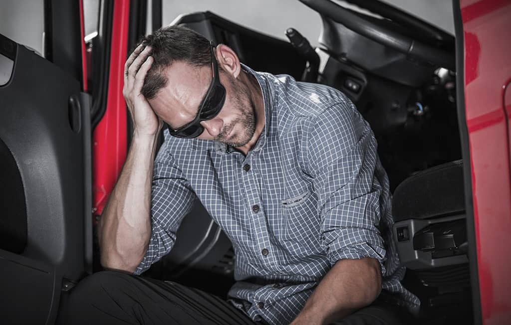 frustrated-truck-driver-2023-11-27-05-09-57-utc-2048x1304-1