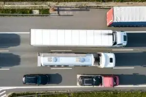 big-freight-trucks-on-a-highway-with-motion-blur-e-2023-09-25-23-33-22-utc-300x200