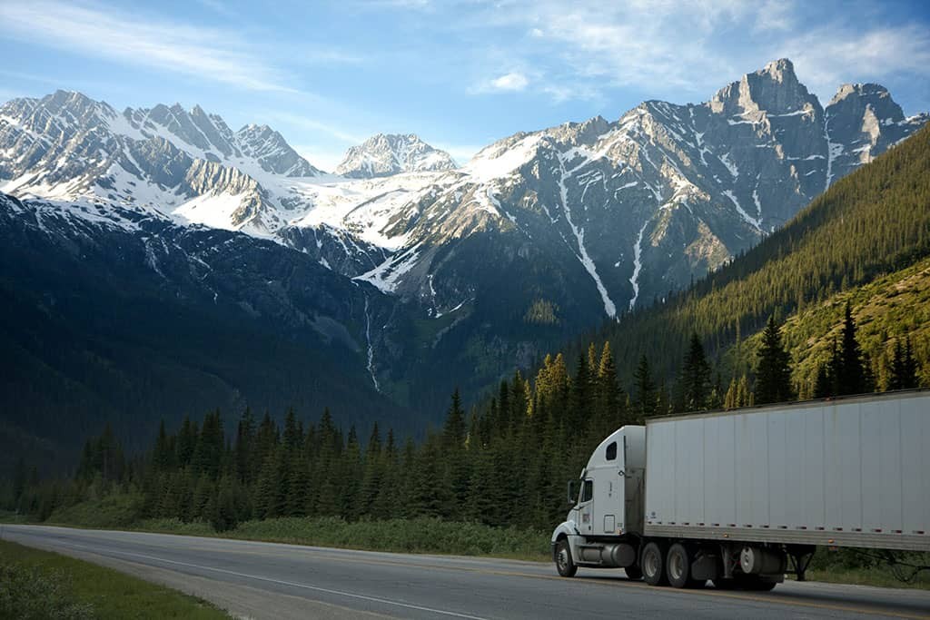 logistics-lorry-mountains-93398-scaled-1-1
