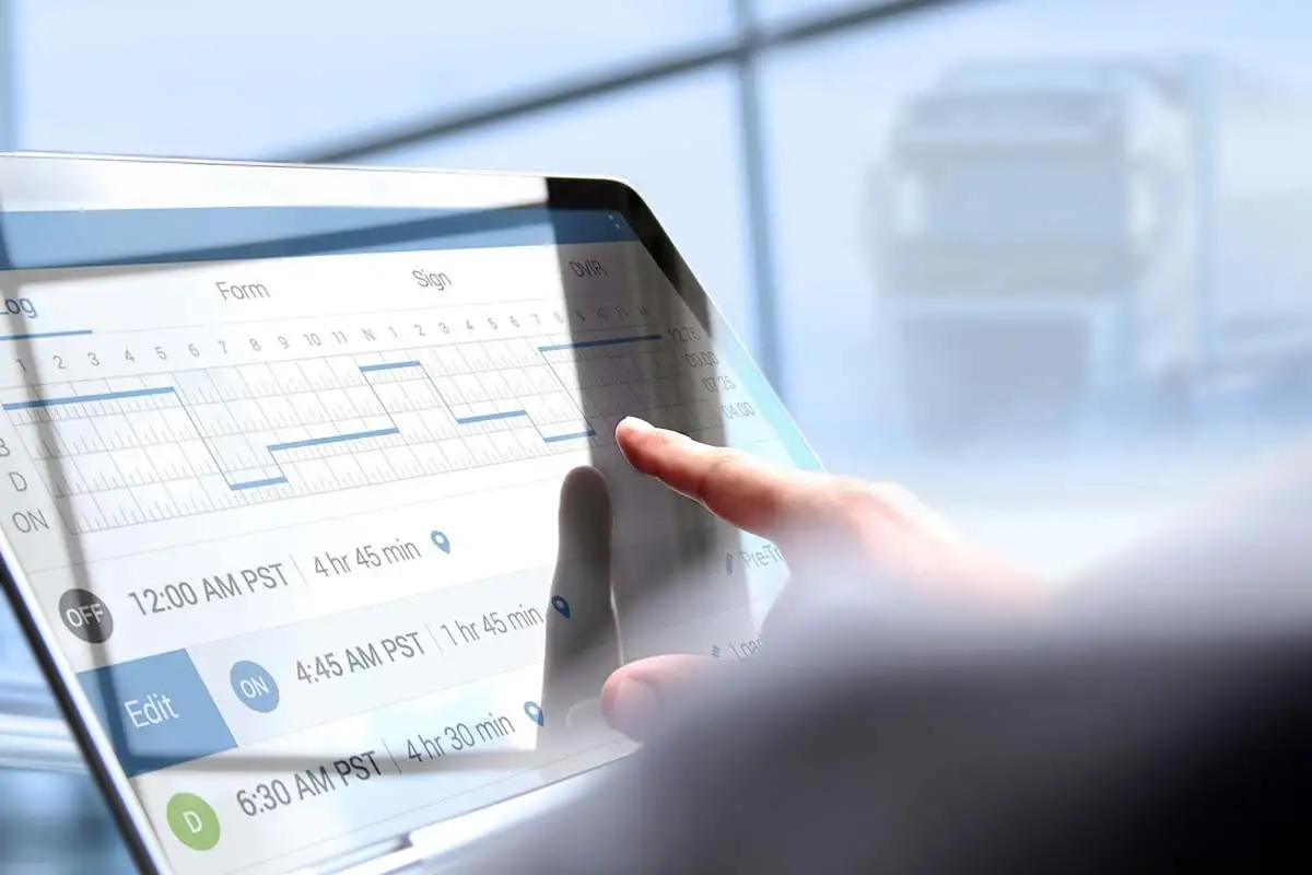 bigstock-Driver-Writing-Electronic-Log-227775928-1